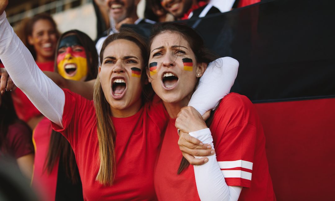German Football Terms - 2 Woman Cheering at the Stadium